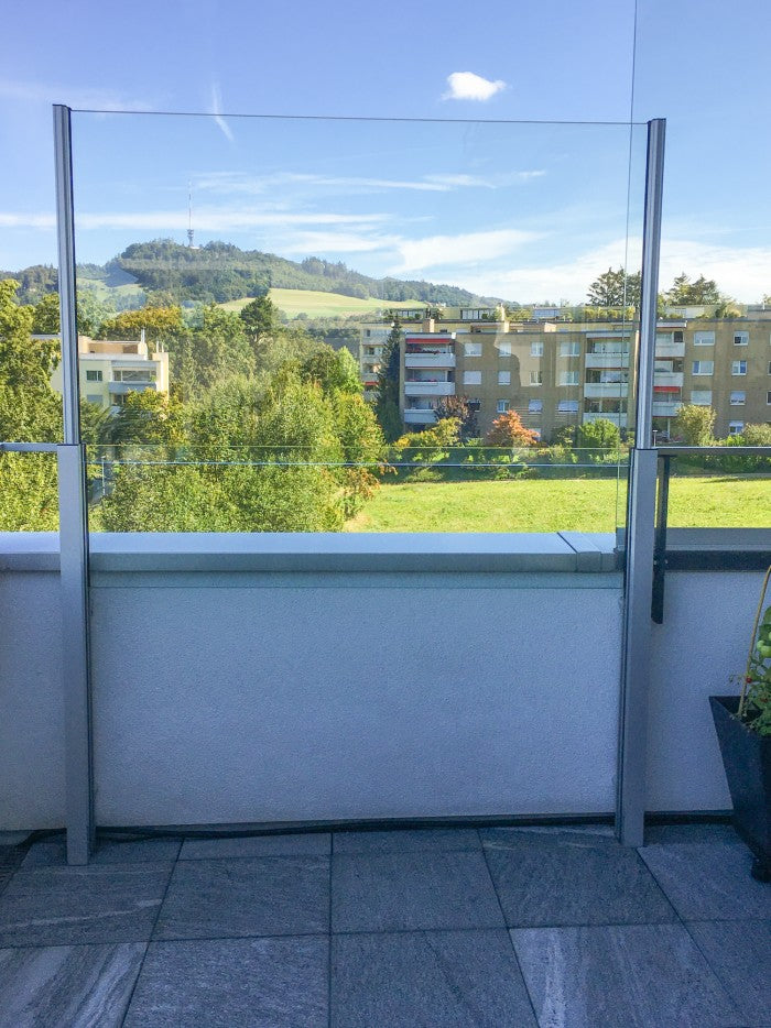 SlideGlass® auf der Dachterrasse mit Blick über das Quartier