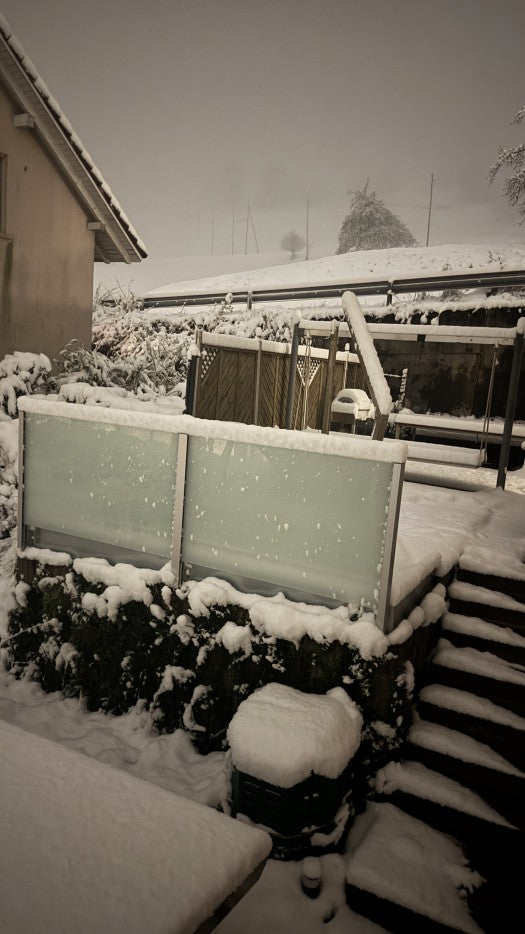 SlideGlass® mit Milchglas im Winter, Terrasse im Schnee